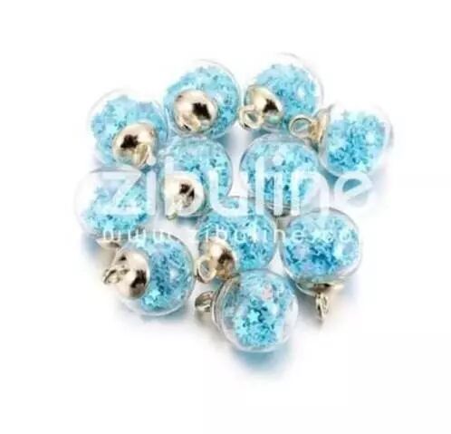 Boule en verre - Capuchon dor�, �toiles bleu clair
