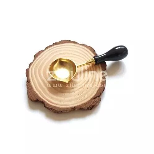 Cuill�re � cire 2 becs - Bois noir et dor�